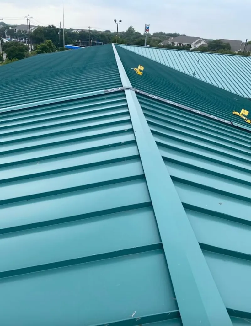 Green commercial metal roof ridge and valley for Metal Roof Repair in Hartselle
